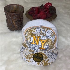 White & gold hat